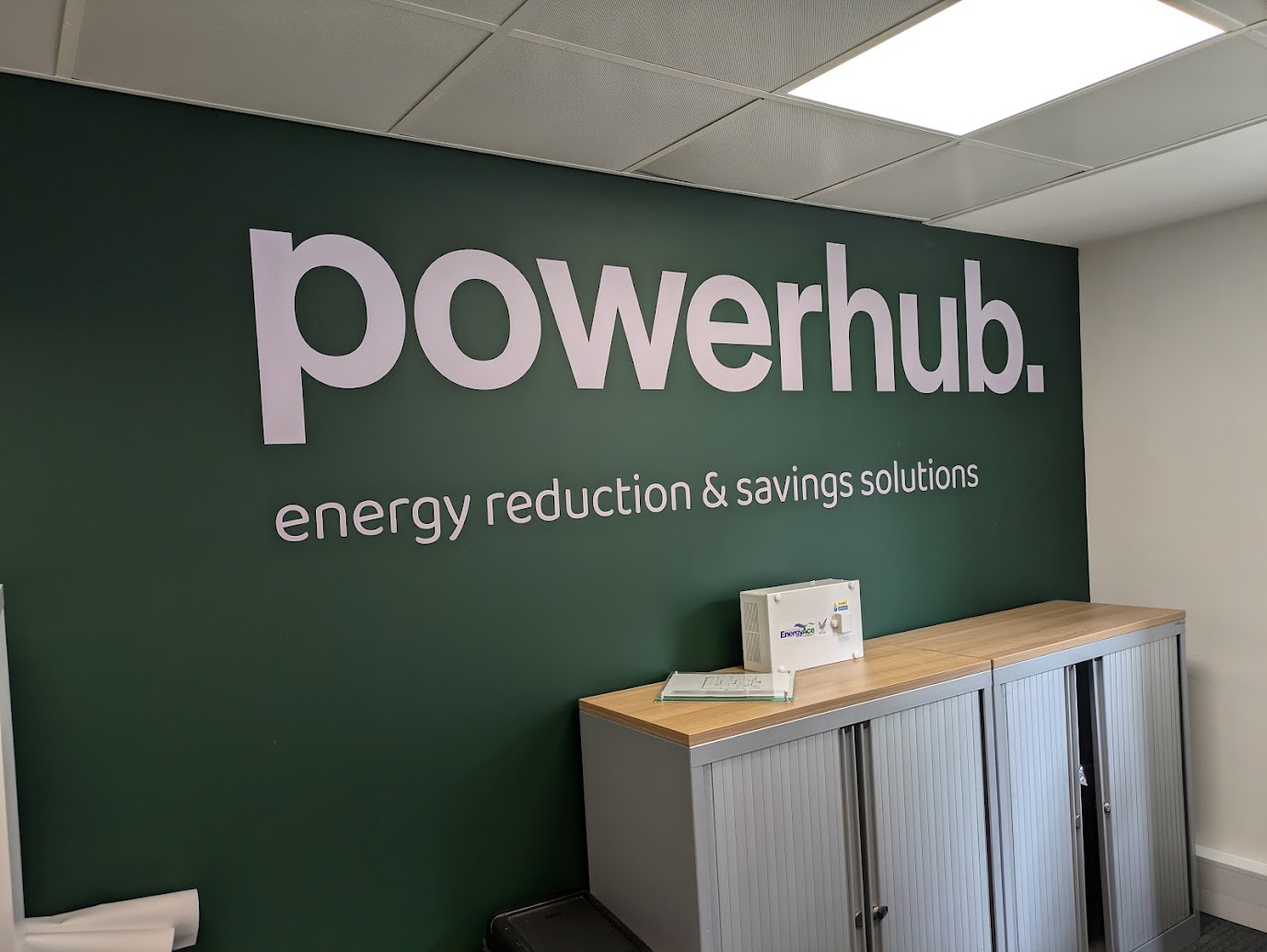 Powerhub Logo, printed onto vinyl and installed onto a green wall